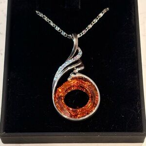 Chic Silver and Orange Swirl Pendant Necklace